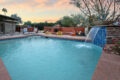 Heated pool with waterfall for year round use. (Fees may apply)