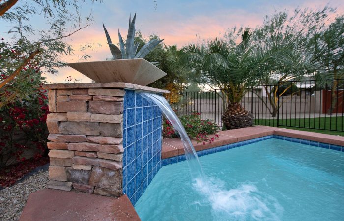 Heated pool with waterfall for year round use. (Fees may apply)